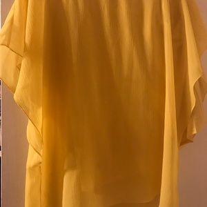 Sheer bright yellow blouse